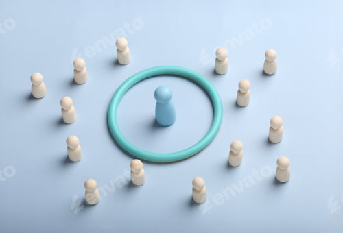 Preview: The concept of a leader. The division of society. Wooden figures on coloured background