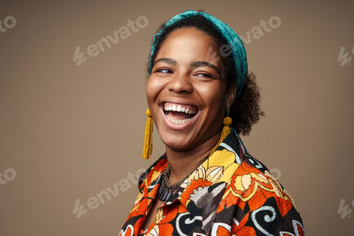 Preview: Young black woman in headband laughing and looking at camera