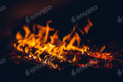 Preview: Closeup of orange flames from burning wood