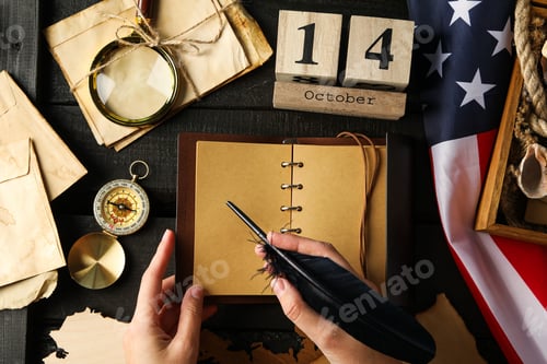 Preview: Columbus Day. Wooden calendar with notebook and American flag
