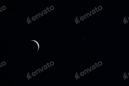 Preview: Waxing Crescent Moon. Moonlight In Night Sky. Bright Crescent Moon On Dark Black Night Sky. Amazing