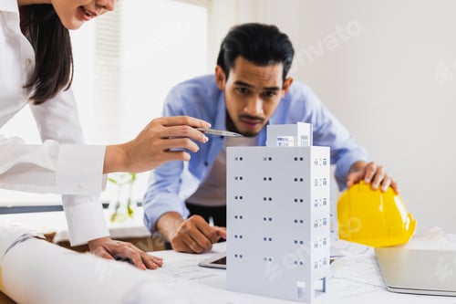 Preview: Architect team in office, engineer designers working in Office check and explaining project plan