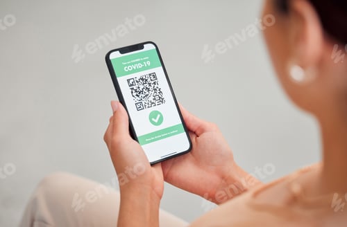 Preview: Covid vaccine passport, digital certificate and immunity travel pass displayed with qr code on phon