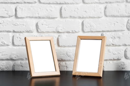 Preview: Photo frame with copy space against white brick wall