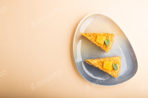 Preview: Homemade cake with persimmon and pumpkin on orange pastel background. top view, copy space.