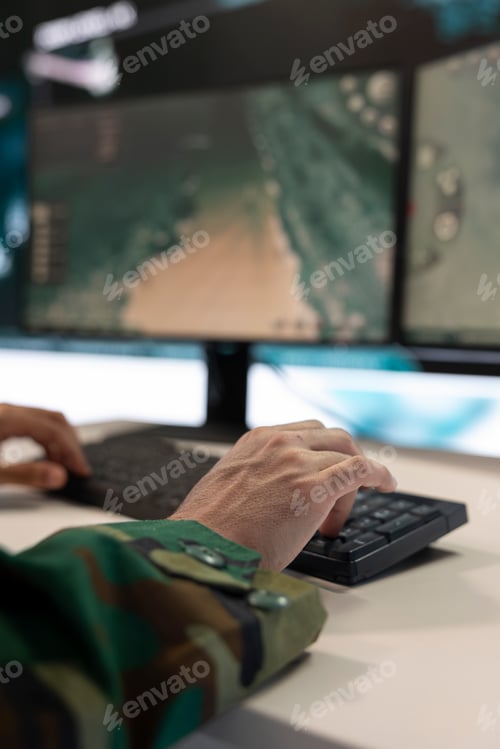 Preview: Combat IT engineer supervising and assisting team members in the field