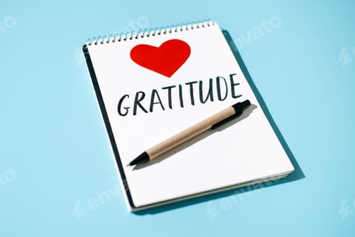 Preview: How to Practice Gratitude. Word Gratitude in open notebook on table.