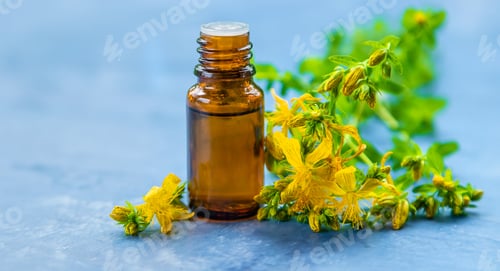 Preview: An essential oil extract of St. John's wort herb. Selective focus.