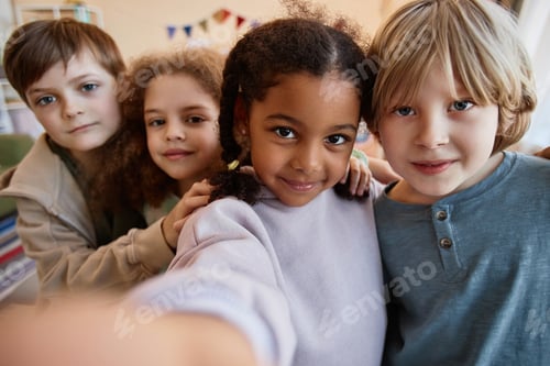 Preview: POV diverse group of happy children taking selfie photo