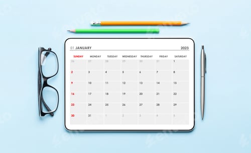 Preview: Tablet with calendar app, eyeglasses and office supplies