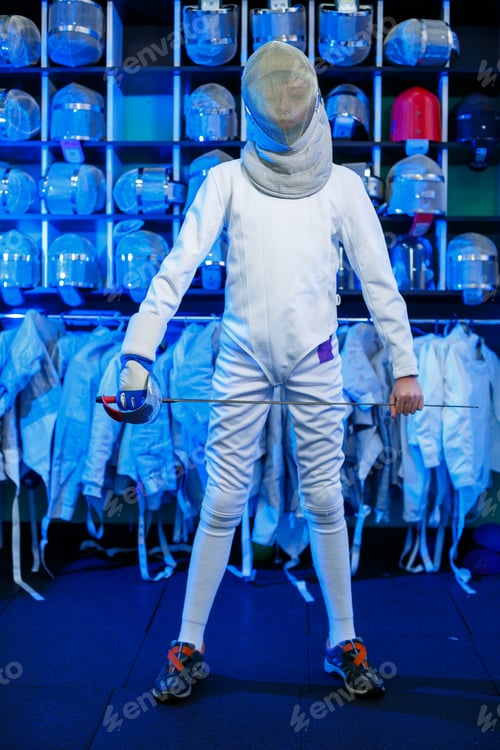 Preview: Young guy in a fencing suit with a sword in his hand, on a blue background, neon light.