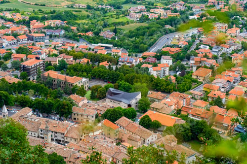 Preview: Republic of San Marino city street top view on tiled roofs