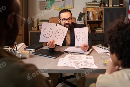 Preview: Psychologist asking boy choose emotion
