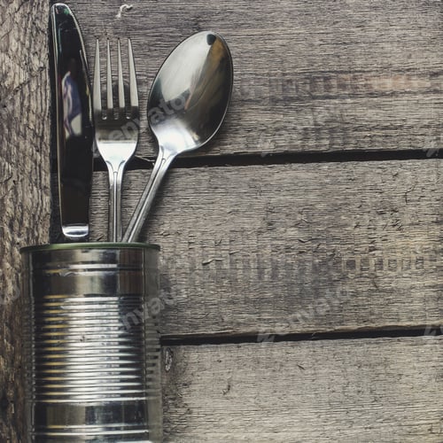 Preview: A Set Of Cutlery (Fork, Knife, Spoon) On A Wooden Background. View From Above.