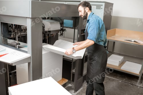 Preview: Feeling a paper into the printing machine