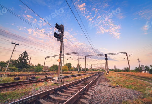 Preview: Train platform and traffic light at sunset. Railroad. Railway st