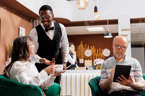 Preview: Hotel employee ensuring comfortable stay