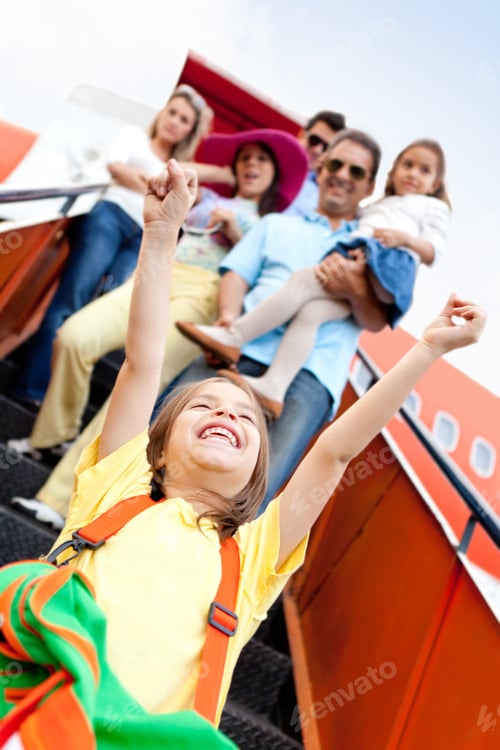 Preview: Group Of Happy People Traveling By Airplane Going On Holidays