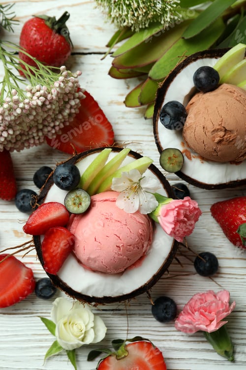 Preview: Concept of delicious fruit ice cream on wooden table
