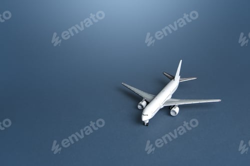 Preview: Passenger plane on a blue gray background.