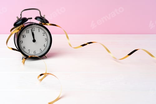 Preview: Christmas and New Year countdown concept with alarm clock