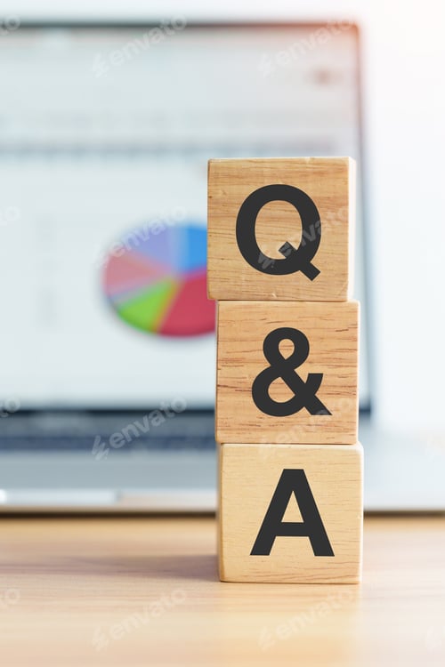 Preview: Questions and Ask wood block and laptop computer
