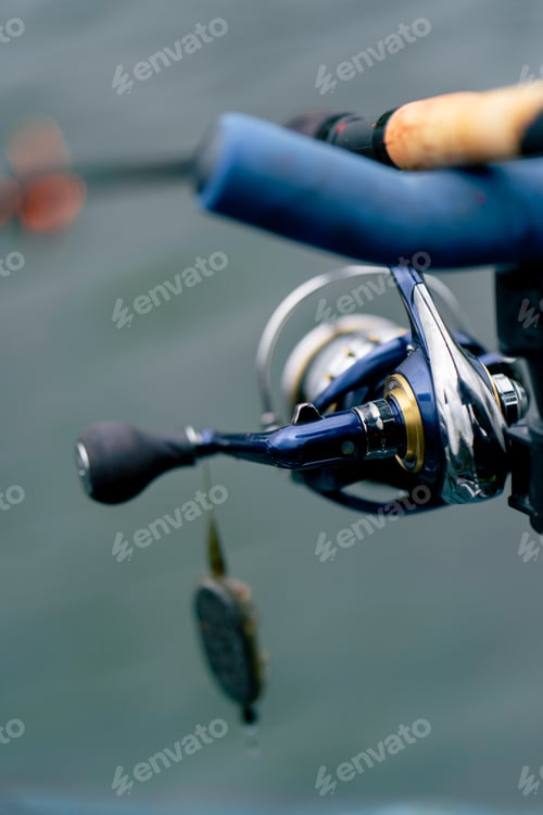 Preview: close-up Fishing tackle fishing spinning hooks and baits fisherman on reservoir feeder free style