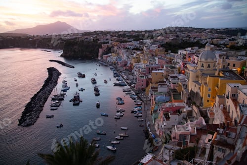 Preview: Beautiful fishing village in sunset, Marina Corricella on Procida Island, Bay of Naples, Italy.