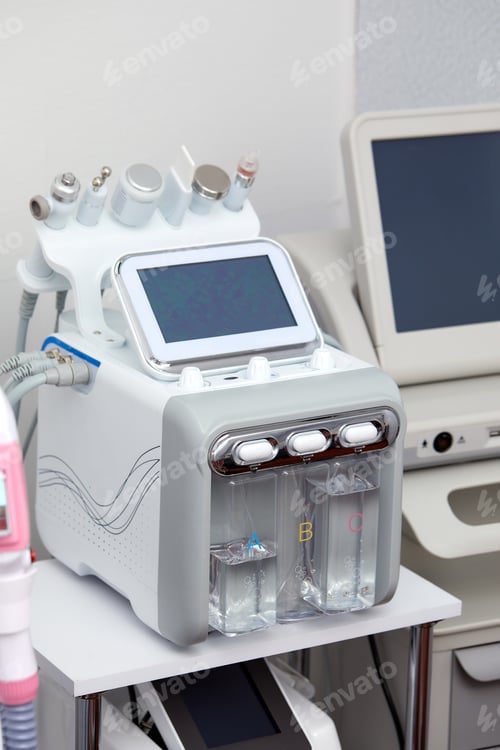 Preview: Skin Treatment Laser Equipment. Medical Worker Sets Indices On Screen Of Laser for cosmetic