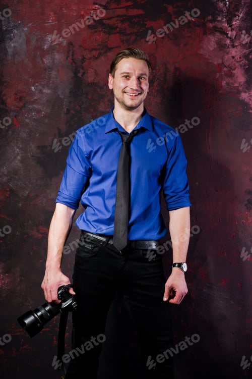 Preview: Studio portrait of stylish professional photographer