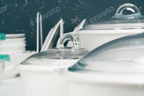 Preview: White pot cookware in a kitchen interior