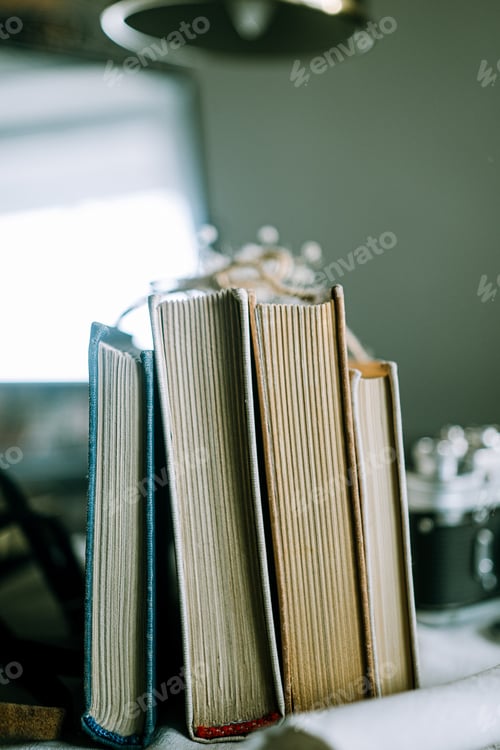 Preview: Old vintage books on table
