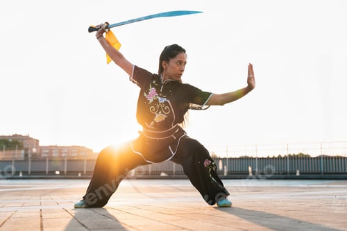 Preview: Chinese young woman practicing wushu kung fu.