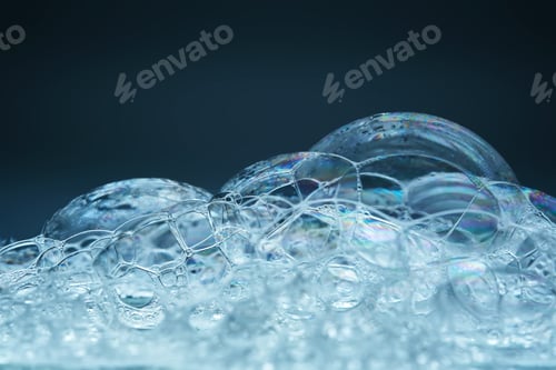 Preview: Beautiful foam texture in blue tones. Bubbles of detergent or bubble bath.