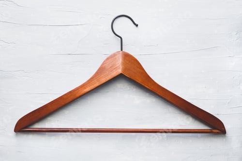 Preview: Wooden Hanger on a Grey Textured Background