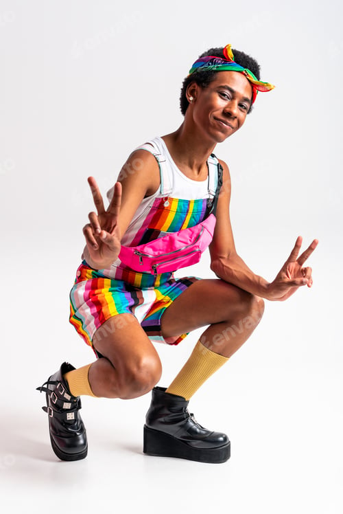 Preview: Fashionable fluid gender man posing in studio