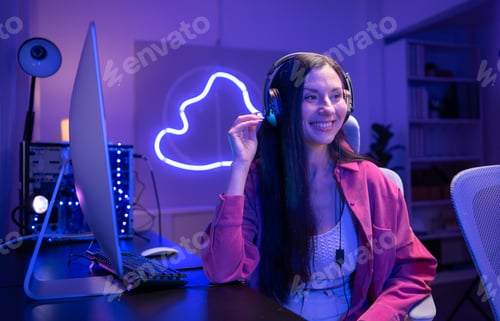 Preview: A content creator or streamer singing into a microphone while interacting with the computer screen