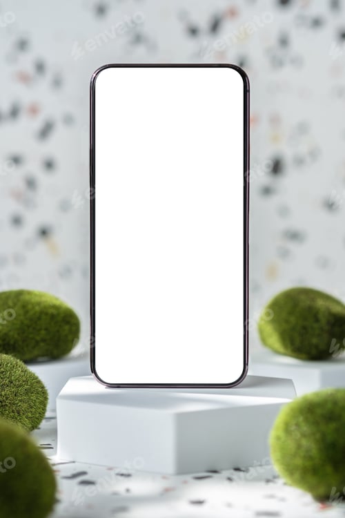 Preview: mobile phone on white geometric pedestal on terrazzo background with summer sunlight and moss rock