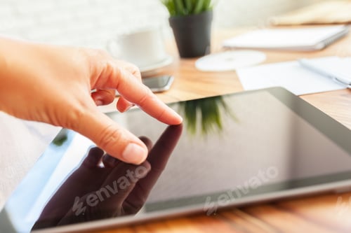Preview: woman is working on tablet
