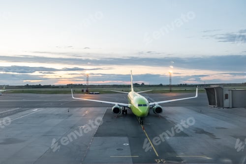 Preview: Airport with airplane at beautiful sunset