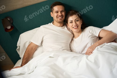 Preview: Young spouses spend the morning together in bed