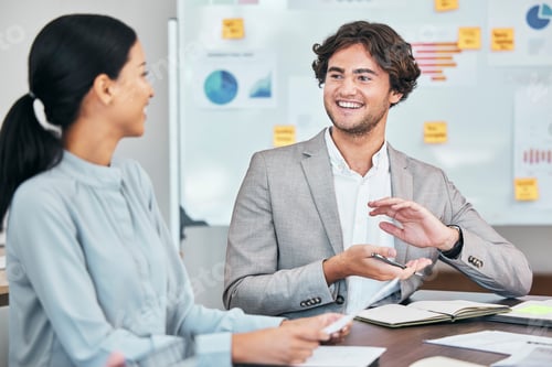 Preview: Meeting, teamwork and planning with a young business man and female colleague talking during a boar