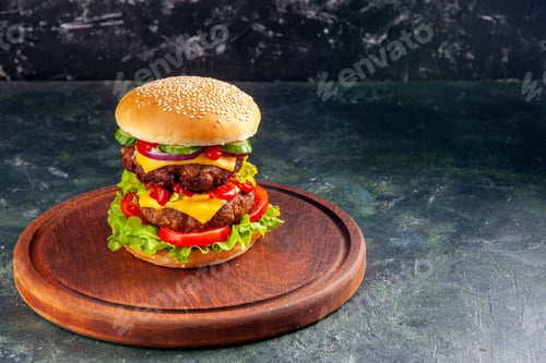 Preview: Front view of tasty sandwich on wooden board on dark color background
