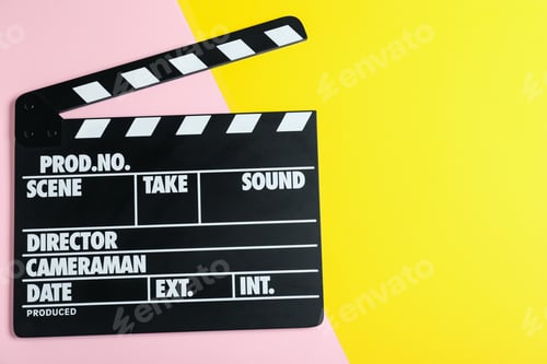 Preview: Clapper board on color background, top view with space for text. Cinema production