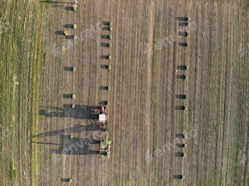 Preview: Green Agricultural fields, people working with machinery