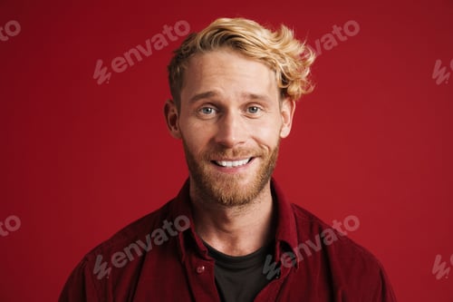Preview: White bearded man wearing shirt smiling and looking at camera
