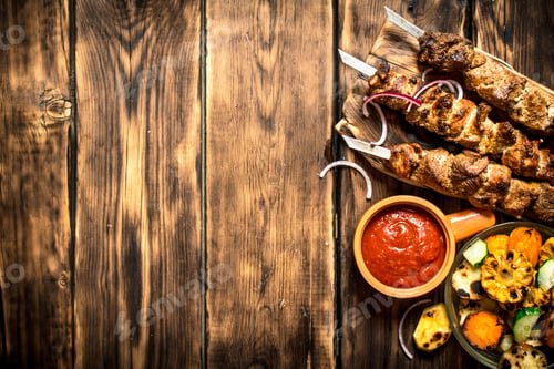 Preview: Kebab with tomato sauce and roasted vegetables.