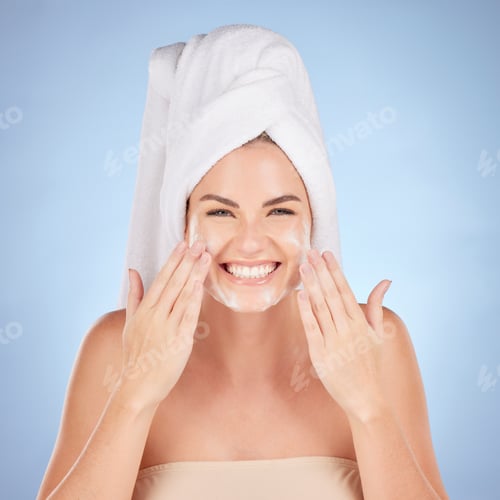 Preview: Shower, woman and portrait of face wash soap in studio, blue background and cleaning cosmetics. Hap