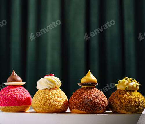 Preview: Delicious colorful pastries displayed on a dessert table at a bakery