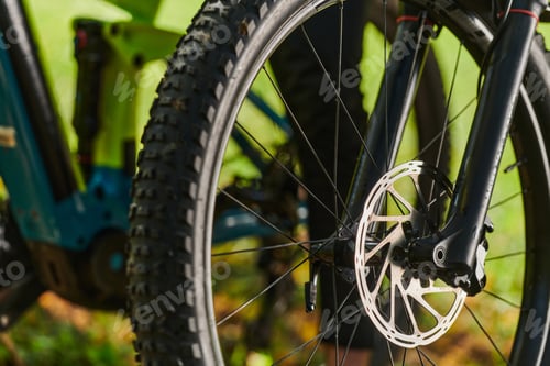 Preview: A sports bicycle races through the park, its components in focused motion spinning wheels, agile